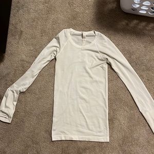 white lululemon swiftly tech long sleeve in size 0.
